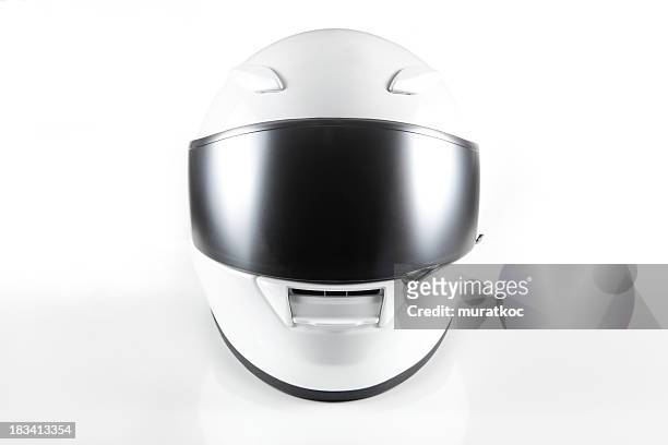 motorcycle casco blanco - motorized sport fotografías e imágenes de stock