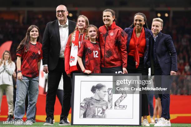Christine Sinclair of Canada poses for a photo during a pregame ceremony before the match against Australia at BC Place on December 05, 2023 in...