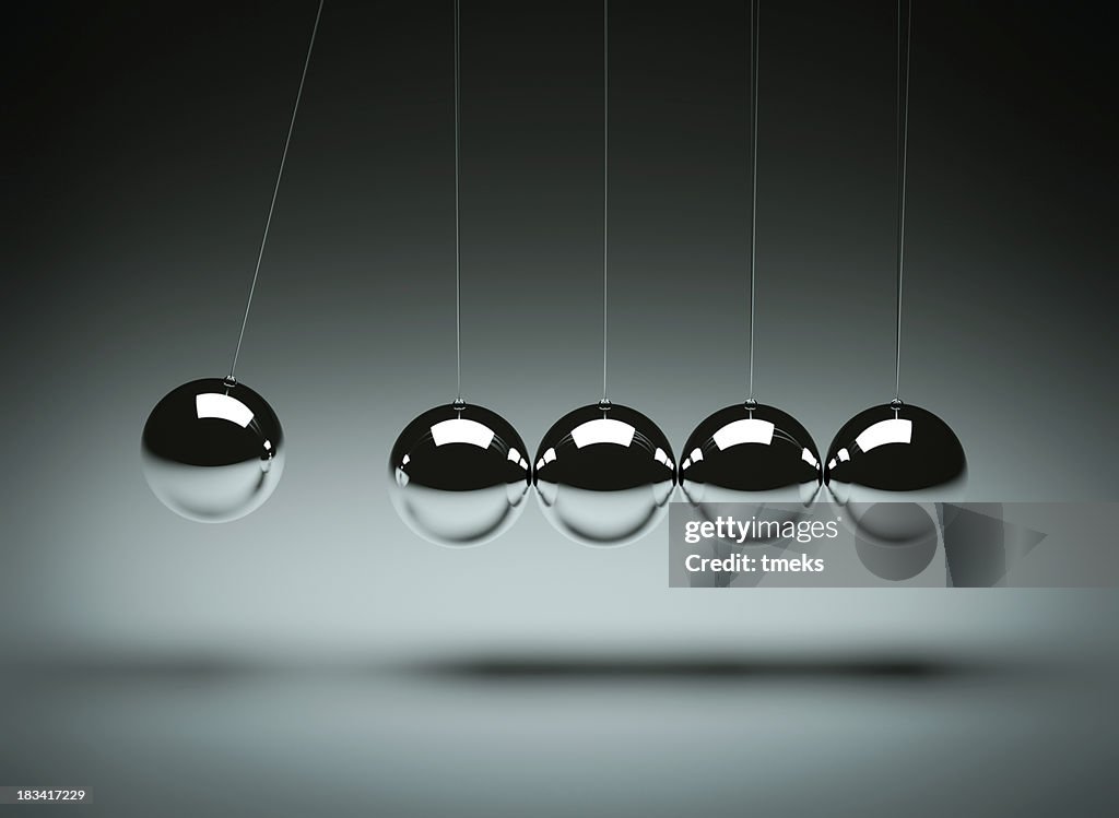 Balancing balls Newton's cradle