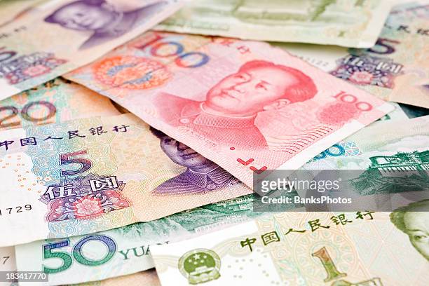 assorted yuan denominations of chinese renminbi - 20 yuan note stock pictures, royalty-free photos & images