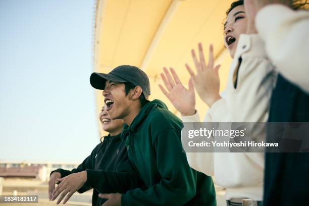 generation z watching sports - encouragement stock pictures, royalty-free photos & images
