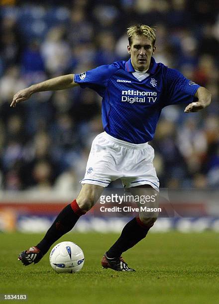 Fernando Ricksen of Rangers runs with the ball during the Bank of Scotland Scottish Premier League match between Rangers and Dundee United held on...