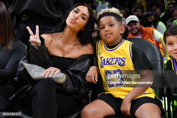 Kim Kardashian and Saint West attend a basketball game between the Los Angeles Lakers and the Phoenix Suns at Crypto.com Arena on December 05, 2023...