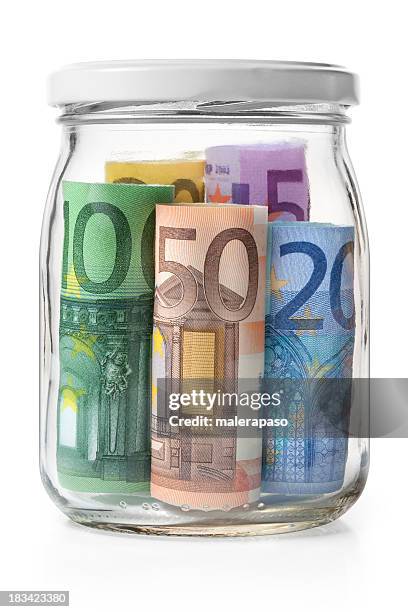 money. euro banknotes in a glass jar. - donation box white background stock pictures, royalty-free photos & images