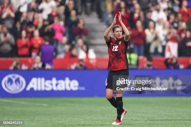 Christine Sinclair of Canada acknowledges fans as she leaves the field during the second half against Australia at BC Place on December 05, 2023 in...