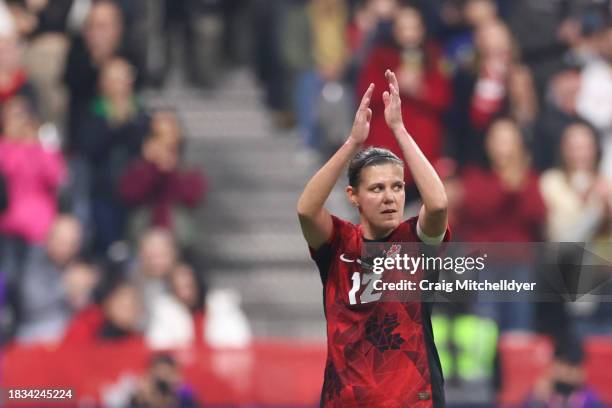 Christine Sinclair of Canada acknowledges fans as she leaves the field during the second half against Australia at BC Place on December 05, 2023 in...