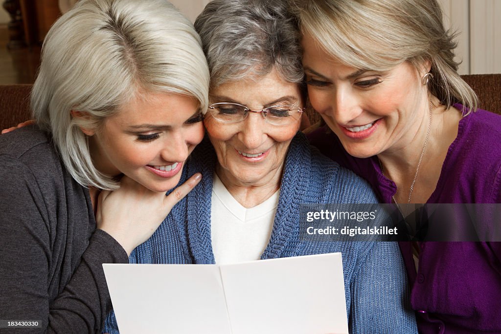 Woman reading a greeting card