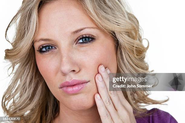 woman with toothache - svullen bildbanksfoton och bilder