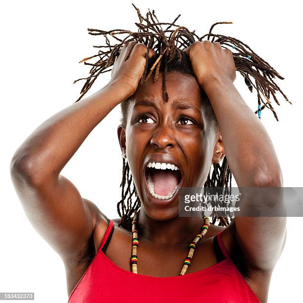 screaming young woman pulling out hair - angry black woman stock pictures, royalty-free photos & images