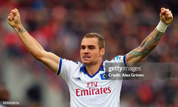 Pierre-Michel Lasogga of Hamburg celebrates his team's second goal during the Bundesliga match between 1. FC Nuernberg and Hamburger SV at Grundig...