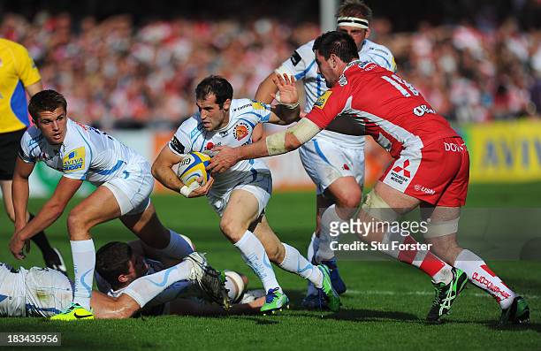 Haydn Thomas of Exeter races past Elliott Stooke of Gloucester during the Aviva Premiership match between Gloucester and Exeter Chiefs at Kingsholm...
