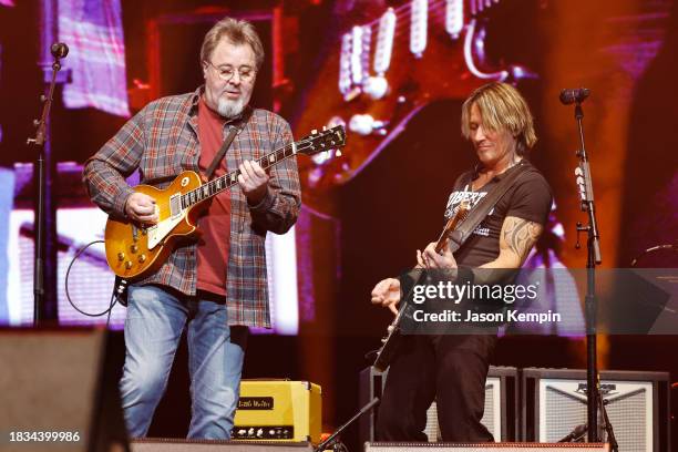 Hosts Vince Gill and Keith Urban perform onstage for All for the Hall a concert benefiting the Country Music Hall of Fame and Museum at Bridgestone...