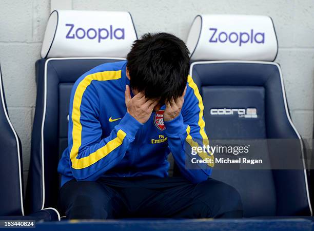 Ryo Miyaichi of Arsenal looks on from the bench prior to the Barclays Premier League match between West Bromwich Albion and Arsenal at The Hawthorns...
