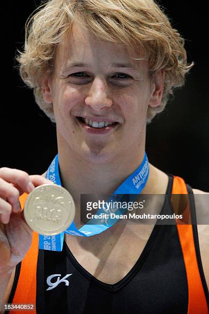 Epke Zonderland of the Netherlands celebrates with the gold medal after winning the Horizontal Bar Final on Day Seven of the Artistic Gymnastics...