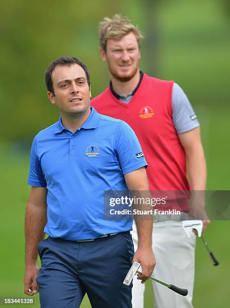 Francesco Molinari of the European team and Chris Wood of the Great Britain and Ireland team during the final days singles matches at the Seve Trophy...