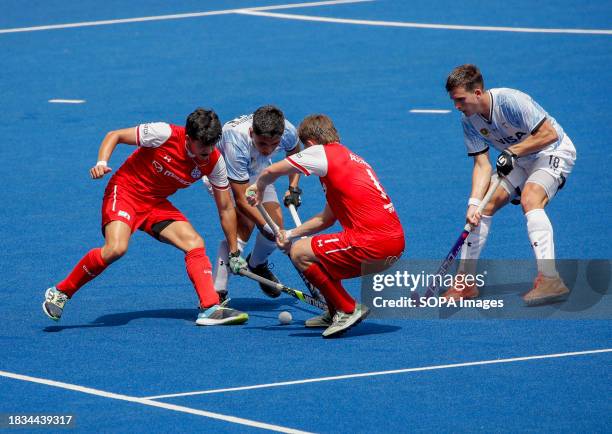 Francisco Cerda , Joaquin Acevedo of Chile, Nicolas Rodriguez , and Lucas Redondo of Argentina seen in action during the FIH Hockey Men's Junior...