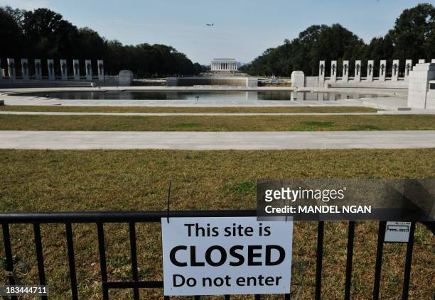 Barricade prevents access to the World World II Memorial as the partial government shutdown enters day six on October 6, 2013 in Washington, DC. AFP...