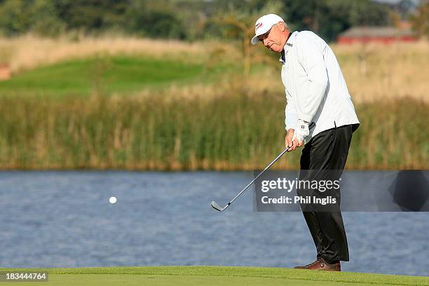 Mike Harwood of Australia in action during the final round of the English Senior Open played at Rockliffe Hall on October 6, 2013 in Durham, United...