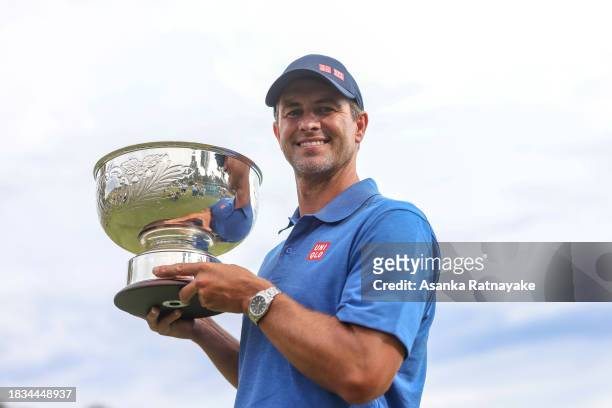 Adam Scott of Australia holds the trophy after winning the 2023 Cathedral Invitational at Cathedral Lodge & Golf Club on December 06, 2023 in...