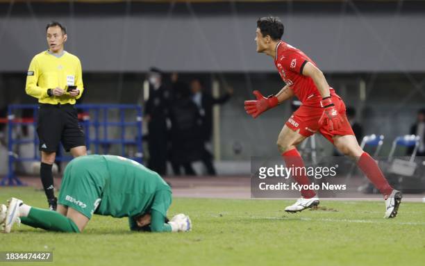 Kawasaki Frontale goalkeeper Jung Sung Ryong reacts after saving a shot from Kashiwa Reysol's Kenta Matsumoto during a penalty shootout in the...