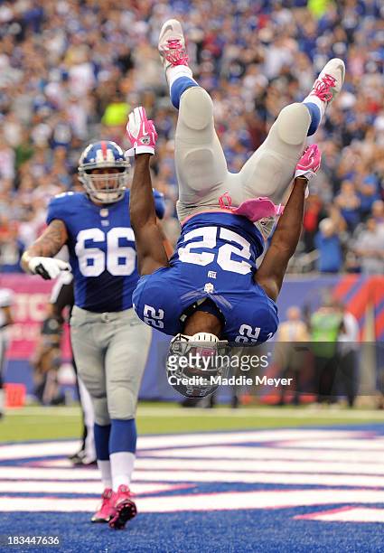 David Wilson of the New York Giants celebrates in the end zone after scoring a touchdown against the Philadelphia Eagles at MetLife Stadium on...