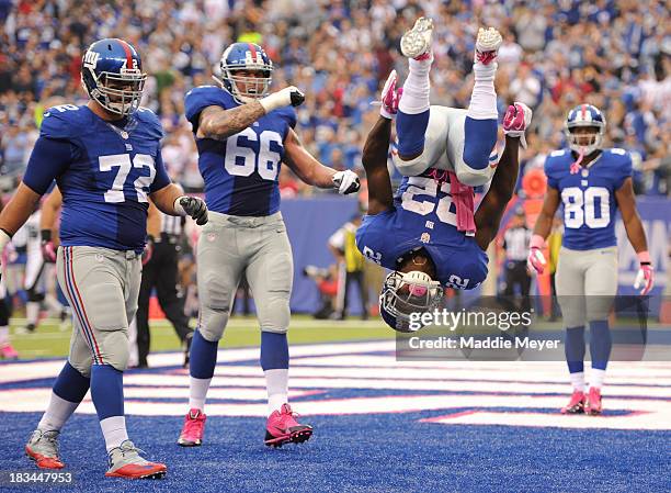 David Wilson of the New York Giants celebrates in the end zone after scoring a touchdown against the Philadelphia Eagles at MetLife Stadium on...