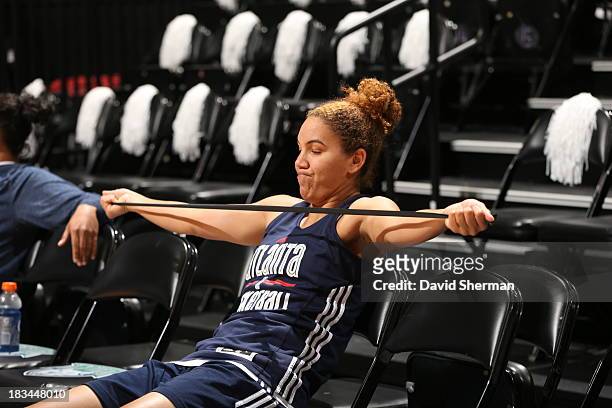 Courtney Clements of the Atlanta Dream stretches during shoot around prior to The 2013 WNBA Finals Game 1 against the Minnesota Lynx on October 6,...
