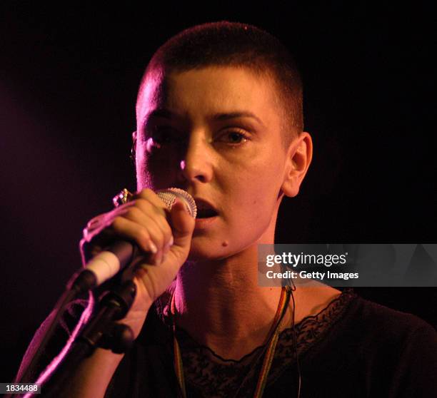 Irish singer Sinead O'Connor sings at a concert in aid of the Chernobyl Children's Project in The Tivoli Theatre March 6, 2003 in Dublin, Ireland.