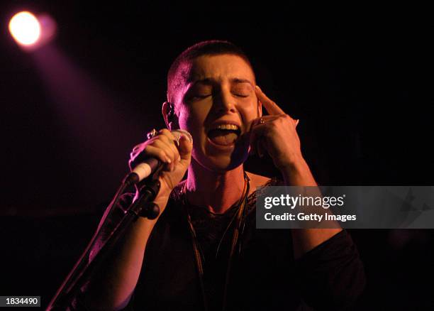 Irish singer Sinead O'Connor sings at a concert in aid of the Chernobyl Children's Project in The Tivoli Theatre March 6, 2003 in Dublin, Ireland.