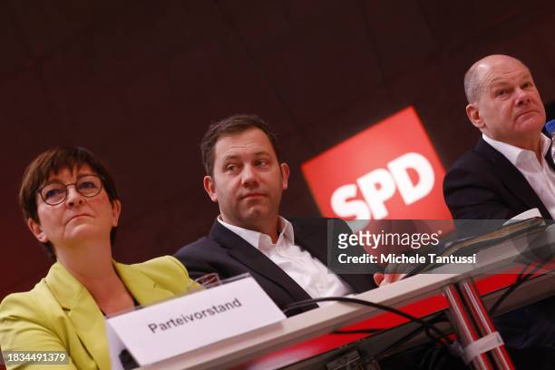 Saskia Esken and Lars Klingbeil, co-chairs of the German Social Democrats speak with German Chancellor, Olaf Scholz at the SPD federal congress on...
