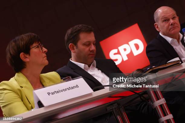 Saskia Esken and Lars Klingbeil, co-chairs of the German Social Democrats speak with German Chancellor, Olaf Scholz at the SPD federal congress on...