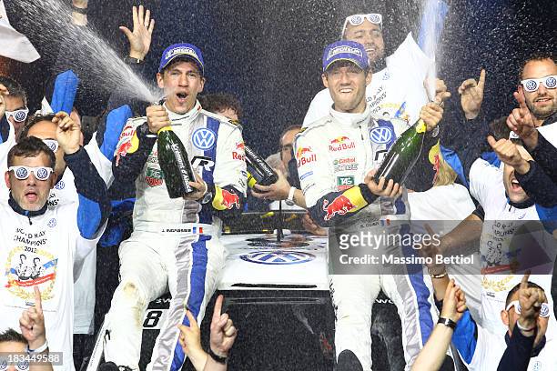 Sebastien Ogier of France and Julien Ingrassia of France celebrate their World Rally Title with all the Volkswagen Motorsport staff members on the...