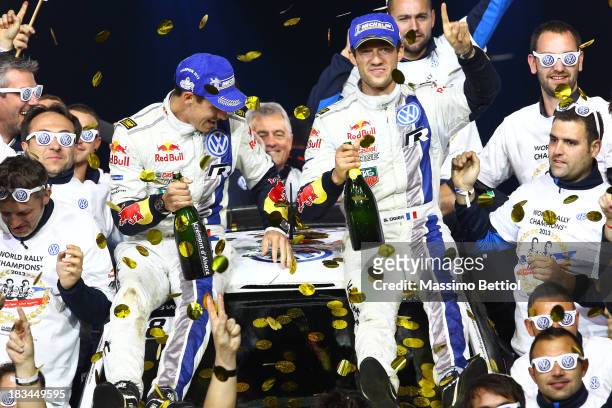 Sebastien Ogier of France and Julien Ingrassia of France celebrate their World Rally Title with all the Volkswagen Motorsport staff members on the...