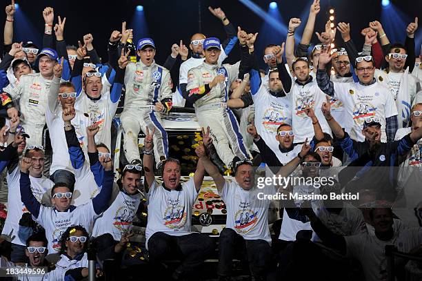 Sebastien Ogier of France and Julien Ingrassia of France celebrate their World Rally Title with all the Volkswagen Motorsport staff members on the...