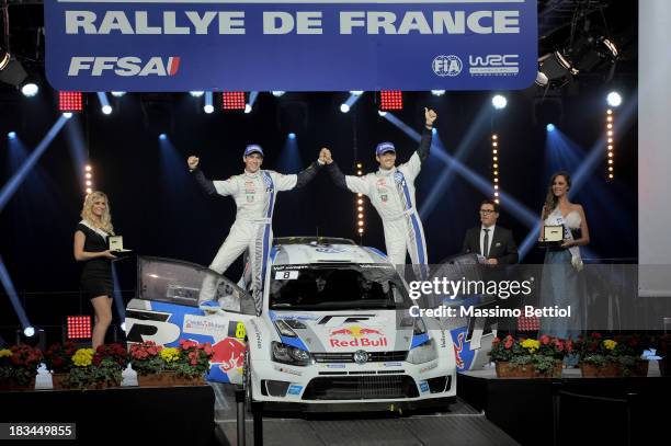 Sebastien Ogier of France and Julien Ingrassia of France celebrate their World Rally Championship Title in the final podium during Day Three of the...