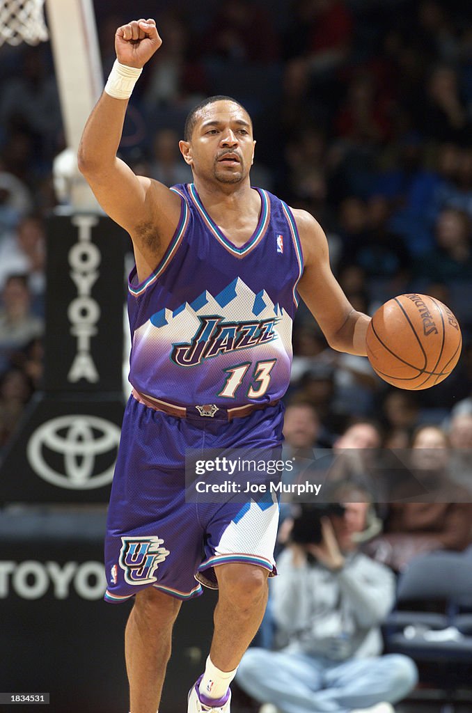 Mark Jackson Racing Mark Jackson of the Utah Jazz drives against the Memphis Grizzlies ...