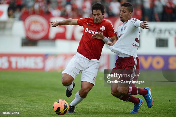 Samuel of Fluminense fights for the ball with Indio of Internacional during the match betwenn Internacional and Fluminense for the Brazilian Series A...