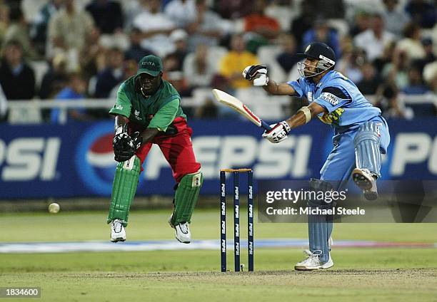 Rahul Dravid of India in unorthodox style as wicketkeeper Kennedy Obuya of Kenya takes off during the ICC Cricket World Cup Super Six game between...