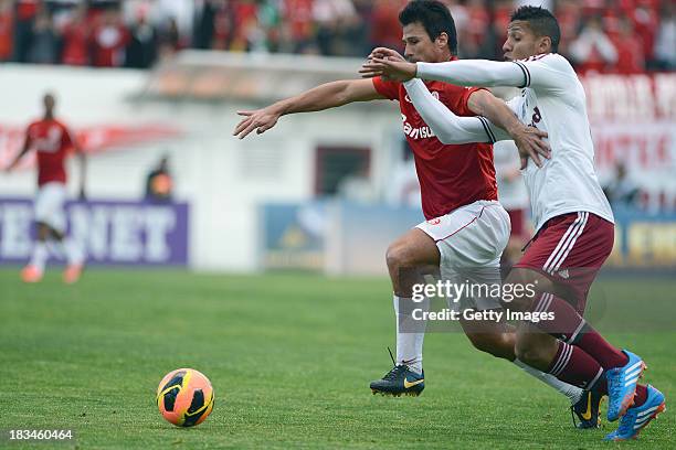 Samuel of Fluminense fights for the ball with Indio of Internacional during the match betwenn Internacional and Fluminense for the Brazilian Series A...