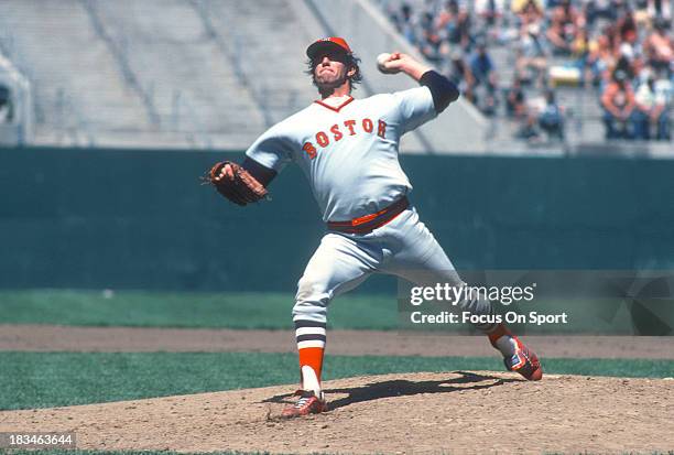 Bill Lee of the Boston Red Sox pitches against the Oakland Athletics during an Major League Baseball game circa 1977 at the Oakland-Alameda County...