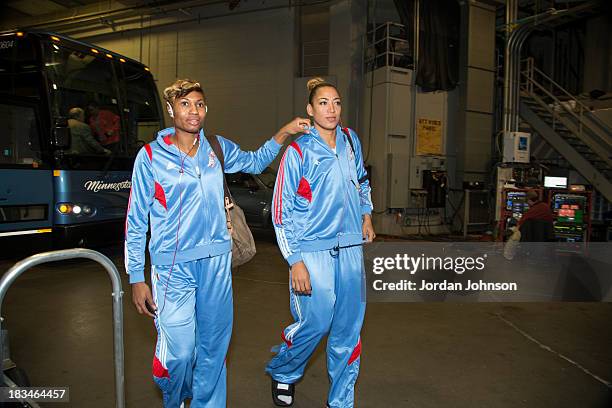 Angel McCoughtry and Erika de Souza of the Atlanta Dream arriving before Game 1 of the 2013 WNBA Finals on October 6, 2013 at Target Center in...