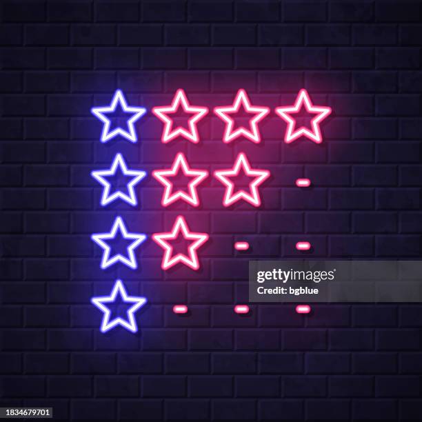star rating. glowing neon icon on brick wall background - looking over wall stock illustrations