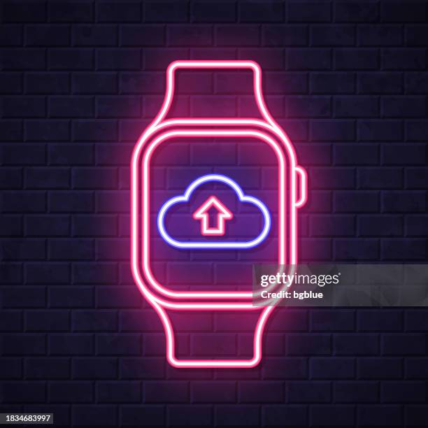 cloud upload from smartwatch. glowing neon icon on brick wall background - sharing files stock illustrations