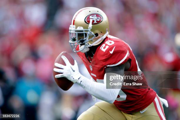 Tramaine Brock of the San Francisco 49ers intercepts a pass by Matt Schaub of the Houston Texans in the first quarter during their game at...