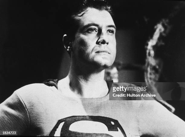 American actor George Reeves holds his head high in a still from the television series, 'Adventures of Superman,' or from one of the films in which...