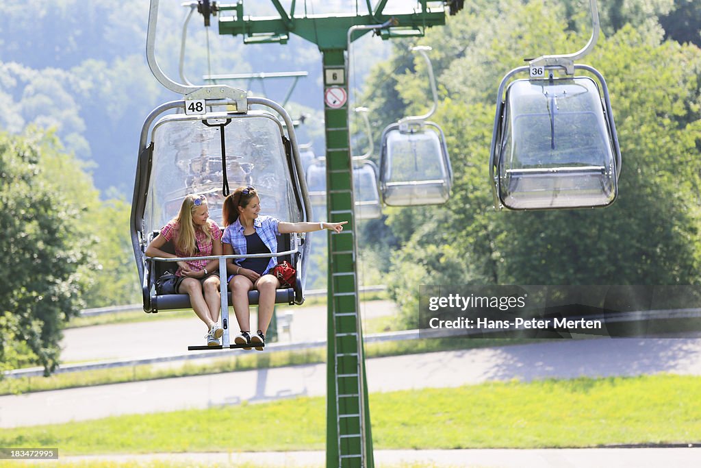 Young woman on chair lift
