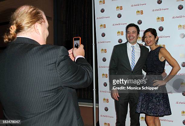 Chef and TV personality Mario Batali photographs comedian and TV personality Jimmy Fallon and actress Jill Hennessy at the 2nd Annual Mario Batali...