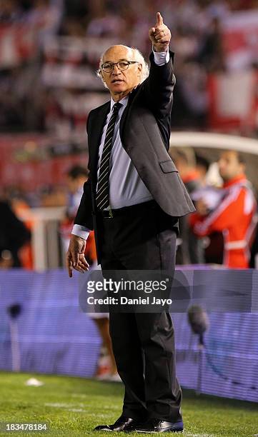 Carlos Bianchi, coach of Boca Juniors, gestures during a match between River Plate and Boca Juniors as part of the Torneo Inicial 2013 at Monumental...