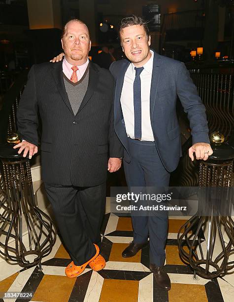 Mario Batali and Jamie Oliver attend 2nd Annual Mario Batali Foundation Honors Dinner at Del Posto Ristorante on October 6, 2013 in New York City.