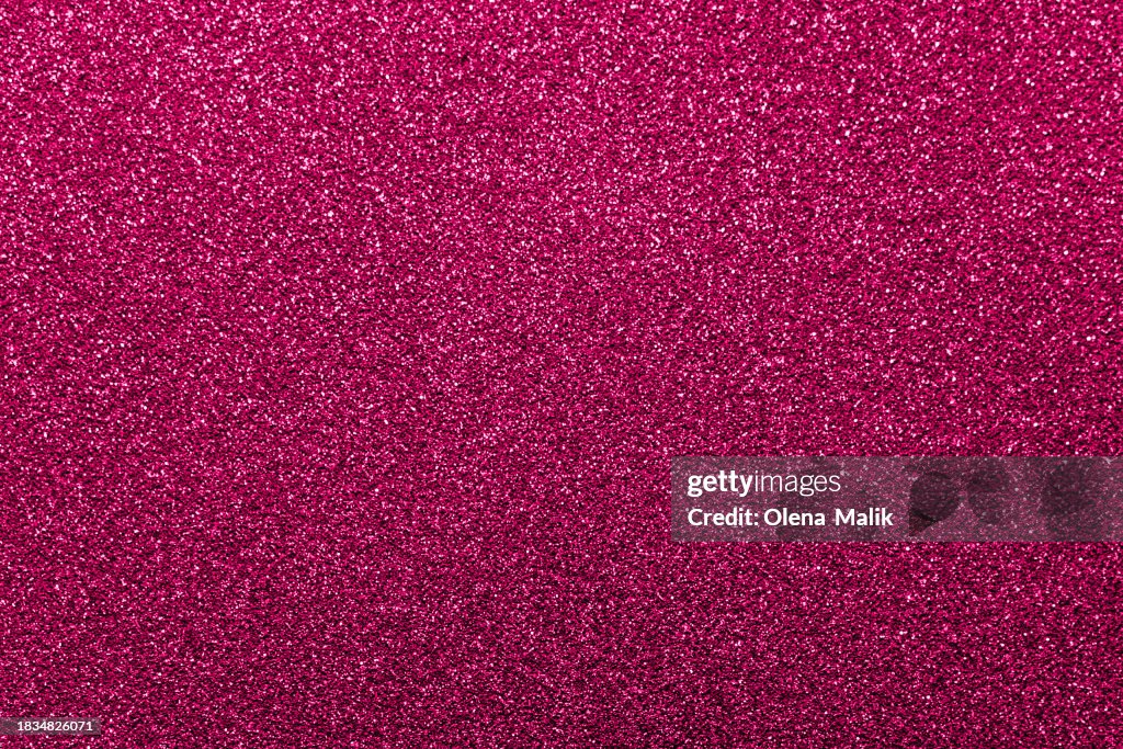 Pink glittering background. New Year and Christmas celebration concept.